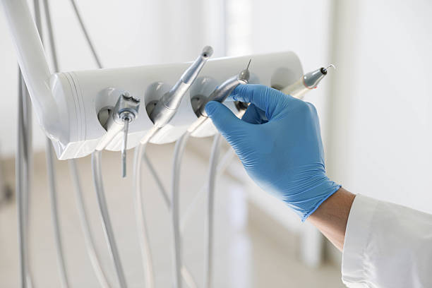 Professional Tooth Extraction technician working in Gleason, TN